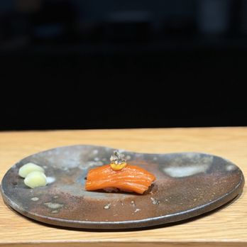 Koya signature dishes  The menu is an evolving multi-course Omakase (chef's tasting menu) that changes based on the freshest available ingredients, showcasing premium fish and seasonal items.
﻿﻿﻿